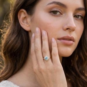 Marina's Swell | Round Cut Aquamarine Halo Engagement Ring.