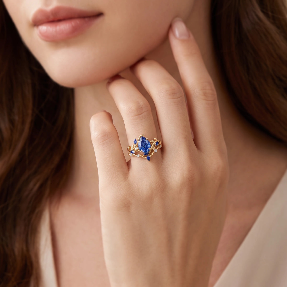 Titania’s Reverie | 1.5CT Fantasy-Cut Pear Blue Sapphire Foliage Bridal Duo