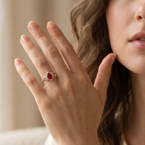 Roselight Briar | Oval Ruby Engagement Ring with Scattered Diamond Leaves