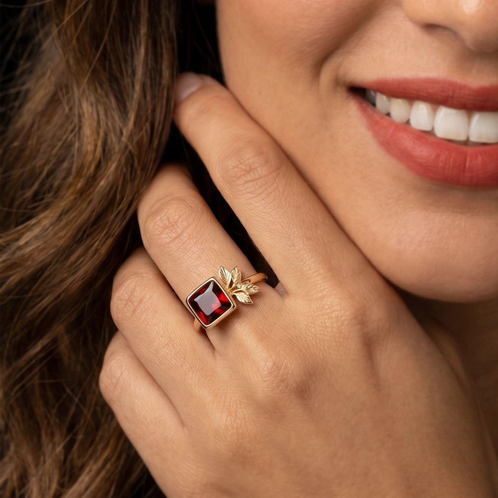 Rosalind’s Solace | Square Garnet Engagement Ring with Asymmetric Leaf.