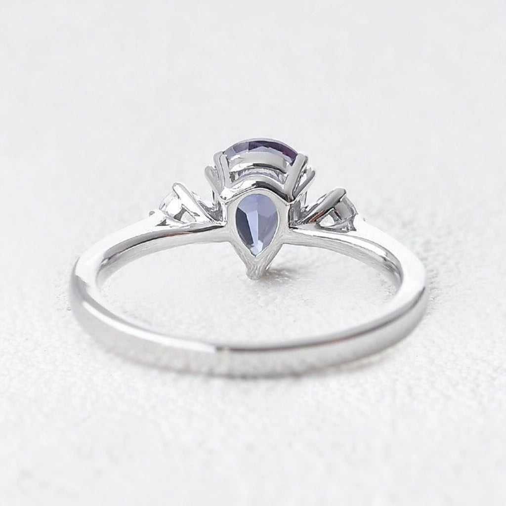 Selene’s Mirage | Pear Tanzanite & Moonstone Engagement Ring