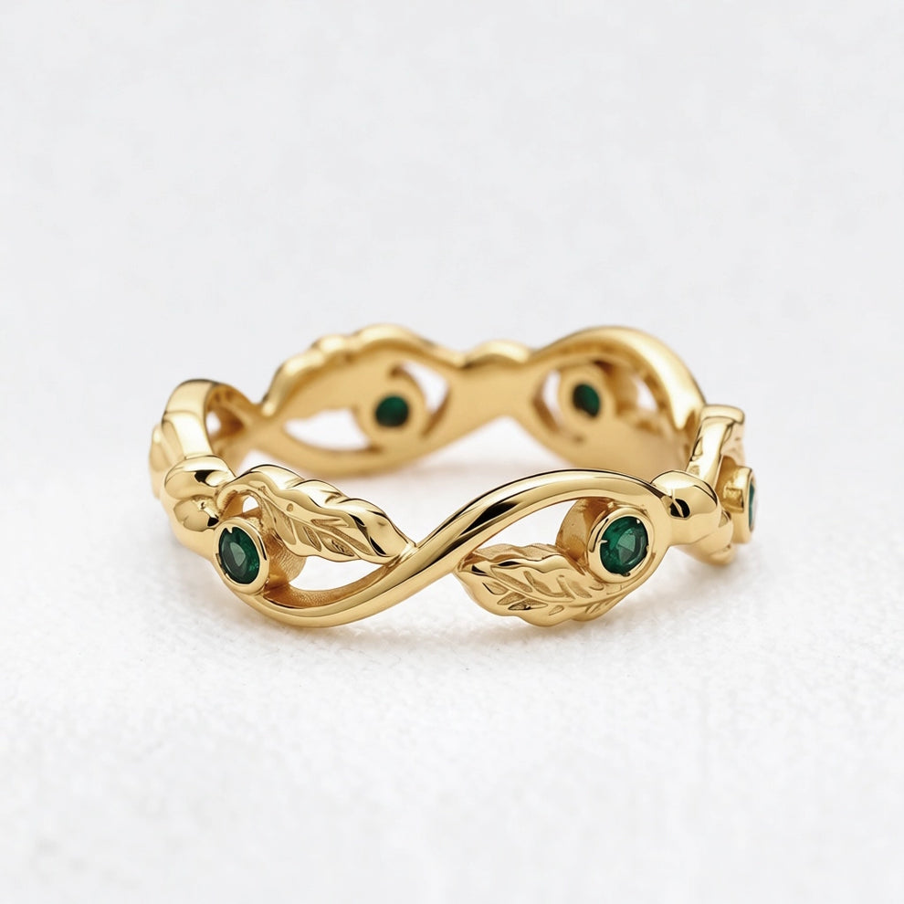 The Lacy Oak | Openwork Oak Leaves & Natural Emerald Women's Wedding Band.