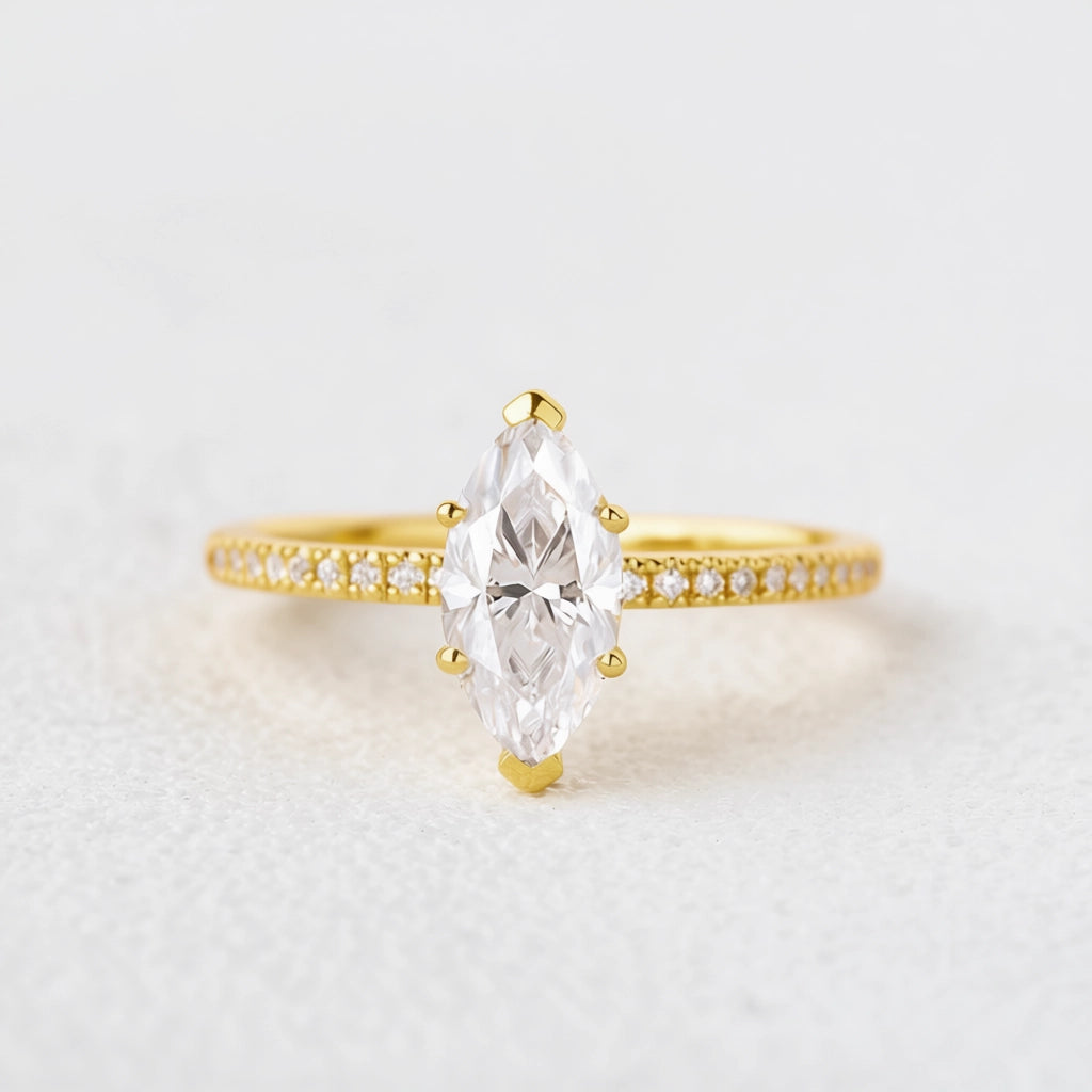 Grace‘s Minimal | Marquise Diamond Solitaire Engagement Ring with Pave Band.