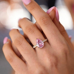 Aurora‘s Grace | 3CT Pear Cut Pink Solitaire Ring.