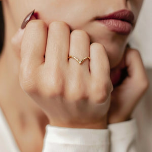 Round Cut Moissanite Half Eternity Curved Wedding Band in Gold.