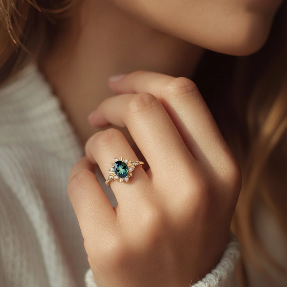 Enshrined Glow | Vintage Oval Cut Emerald Halo Engagement Ring.