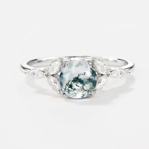Lavinia‘s Stillness | Classic Round Cut Moss Agate Engagement Ring.