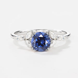 Lavinia‘s Stillness | Classic Round Cut Moss Agate Engagement Ring.