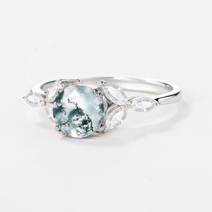 Lavinia‘s Stillness | Classic Round Cut Moss Agate Engagement Ring.