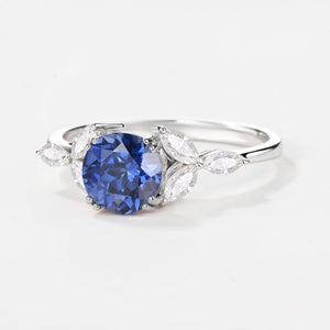 Lavinia‘s Stillness | Classic Round Cut Moss Agate Engagement Ring.
