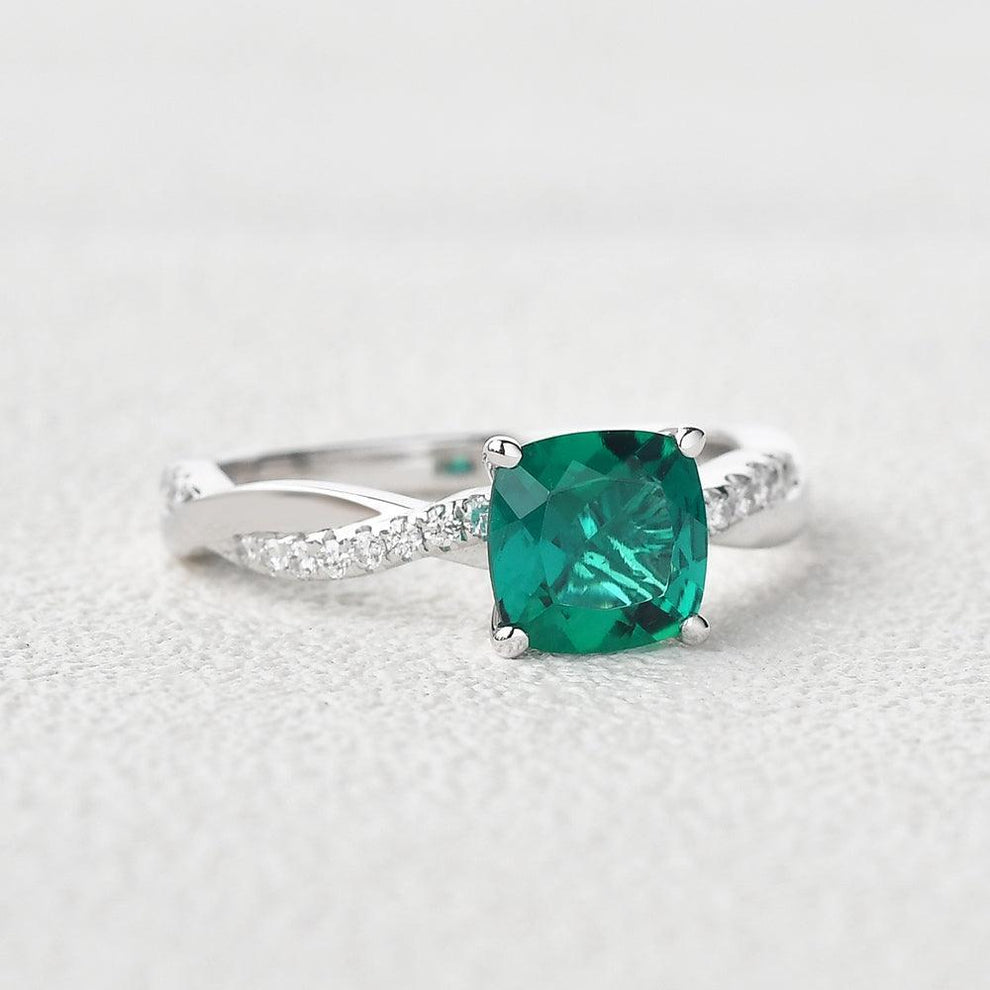 Ivy’s Twist | 2CT Cushion Cut Emerald Solitaire Engagement Ring.