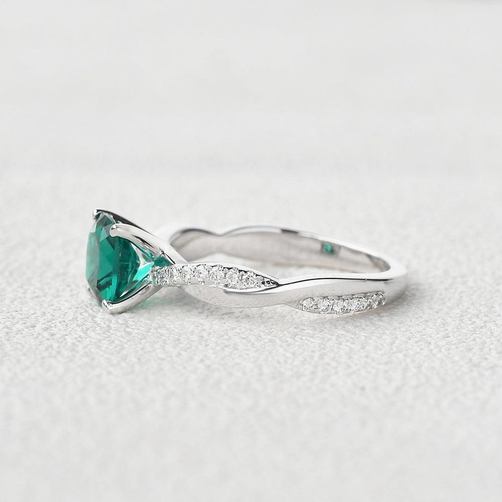 Ivy’s Twist | 2CT Cushion Cut Emerald Solitaire Engagement Ring.