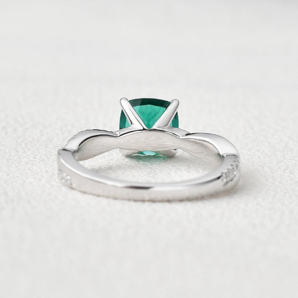 Ivy’s Twist | 2CT Cushion Cut Emerald Solitaire Engagement Ring.