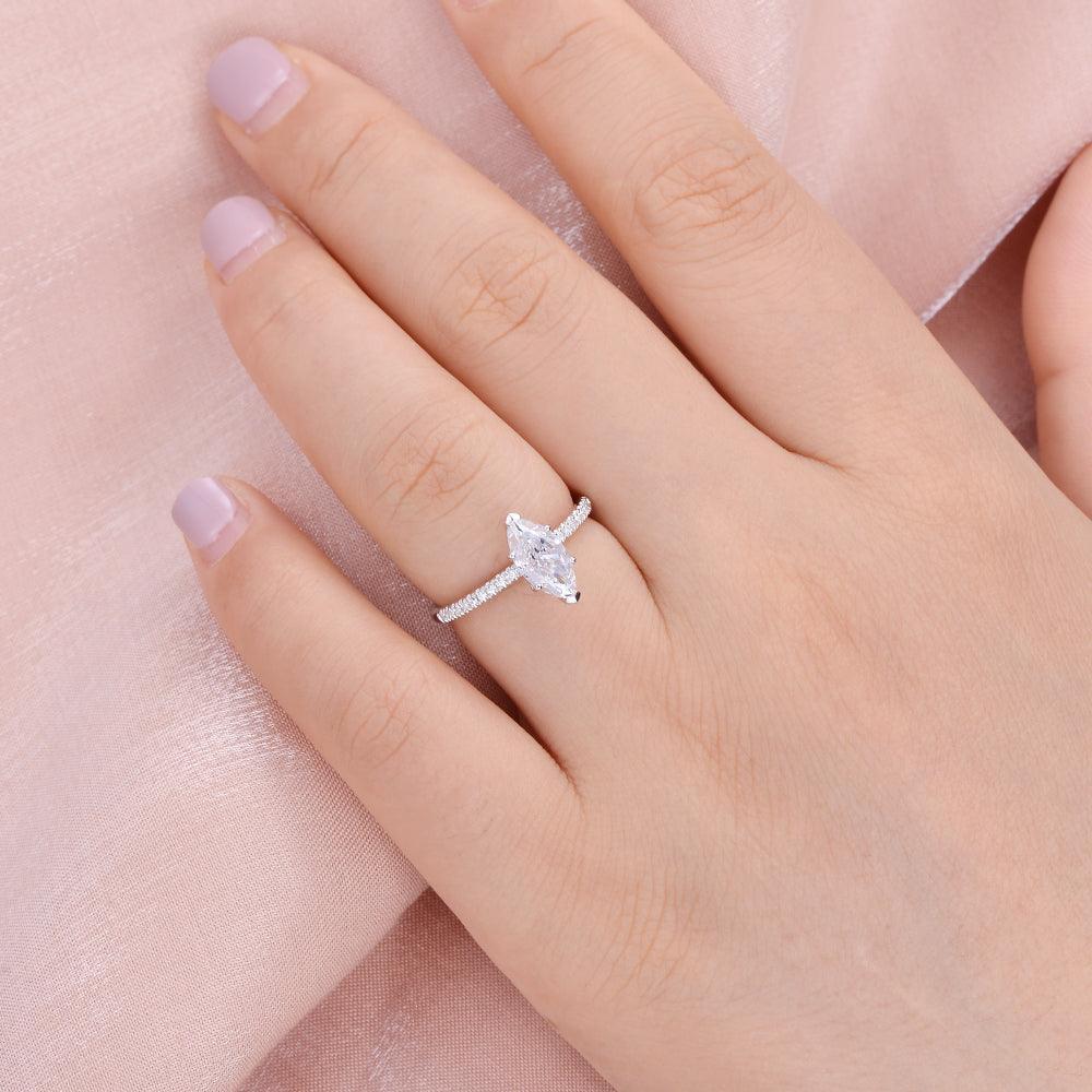 Grace‘s Minimal | Marquise Diamond Solitaire Engagement Ring with Pave Band.