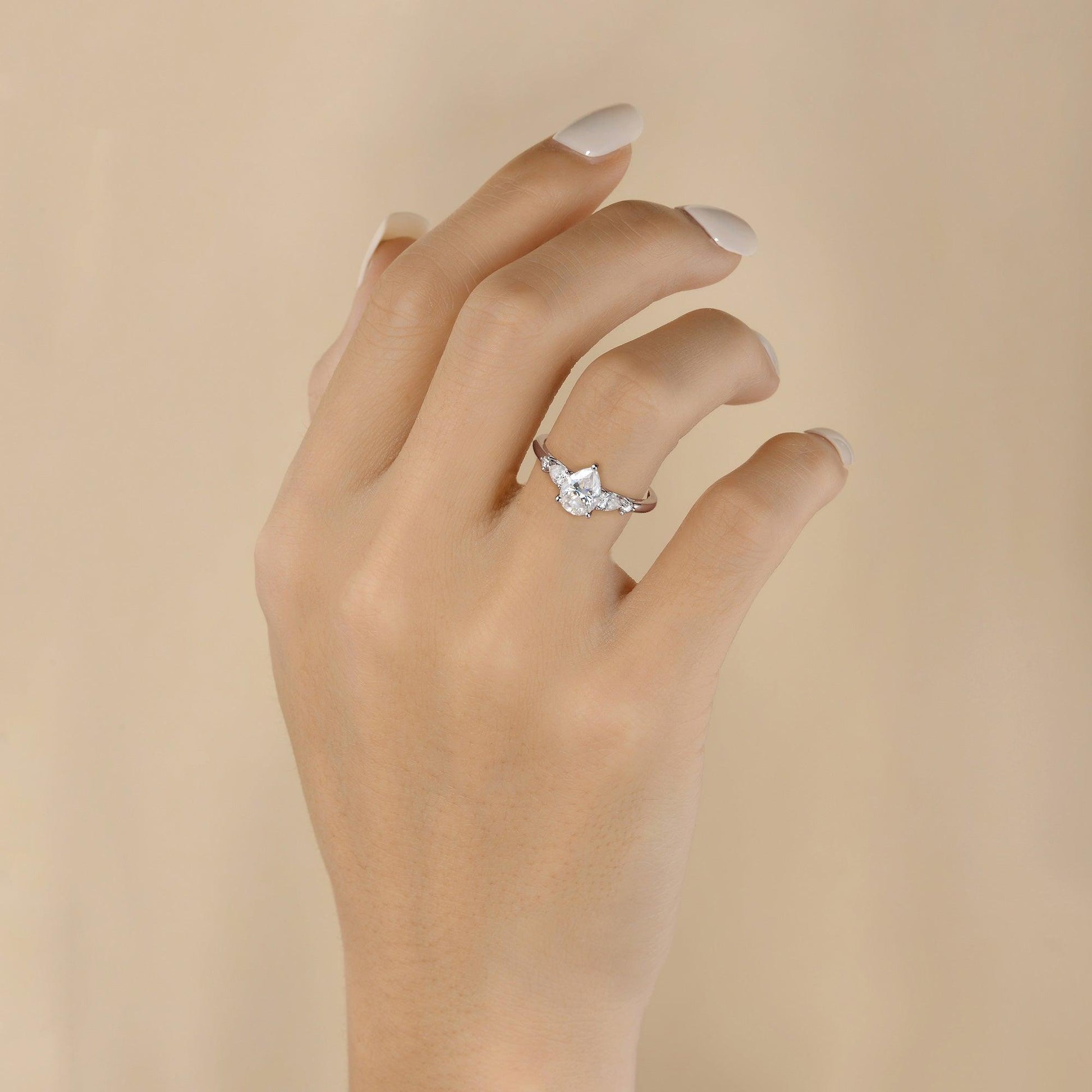 Stylist Pear Shaped Moissanite Rose Gold Ring