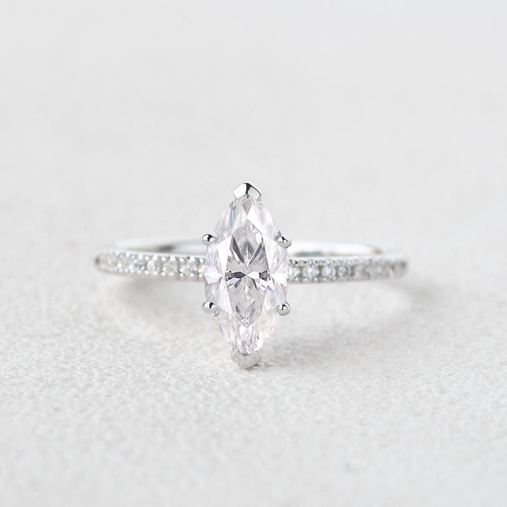 Grace‘s Minimal | Marquise Diamond Solitaire Engagement Ring with Pave Band.