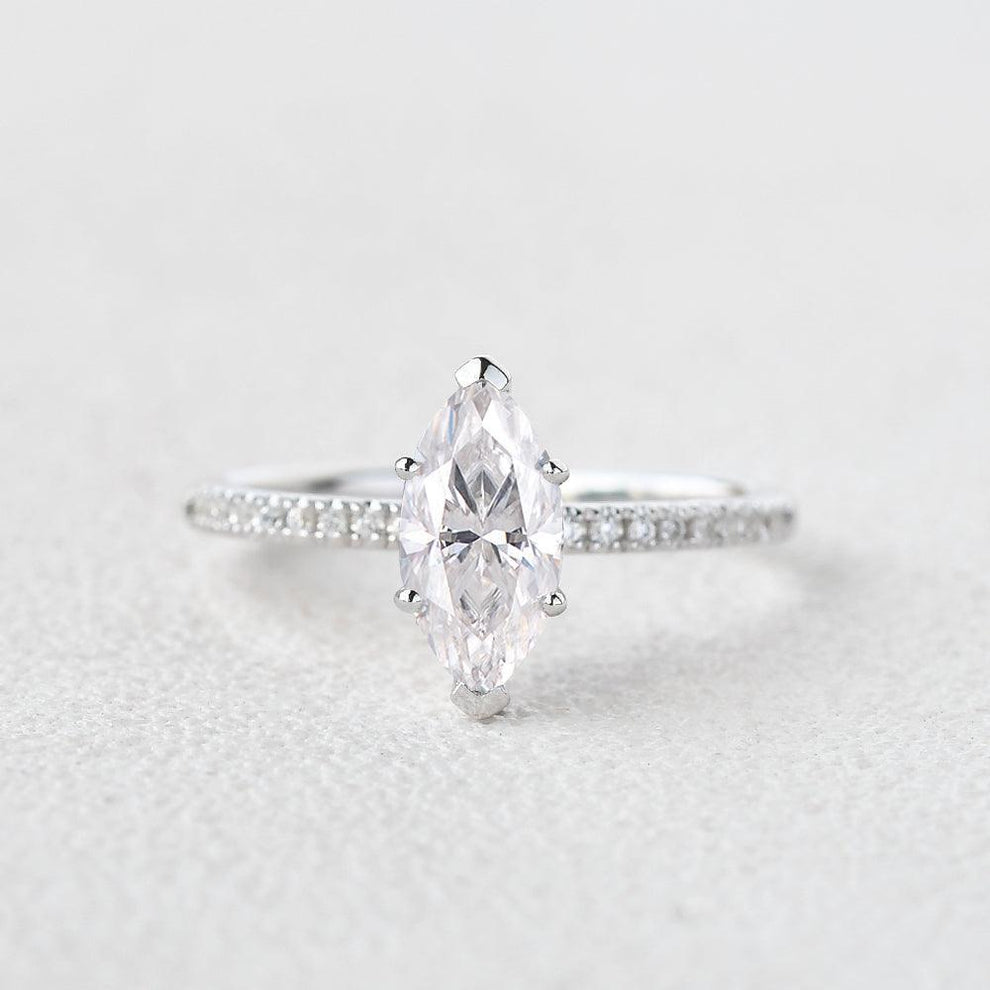 Grace‘s Minimal | Marquise Diamond Solitaire Engagement Ring with Pave Band.