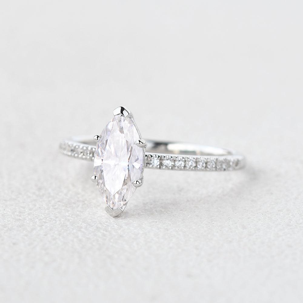 Grace‘s Minimal | Marquise Diamond Solitaire Engagement Ring with Pave Band.