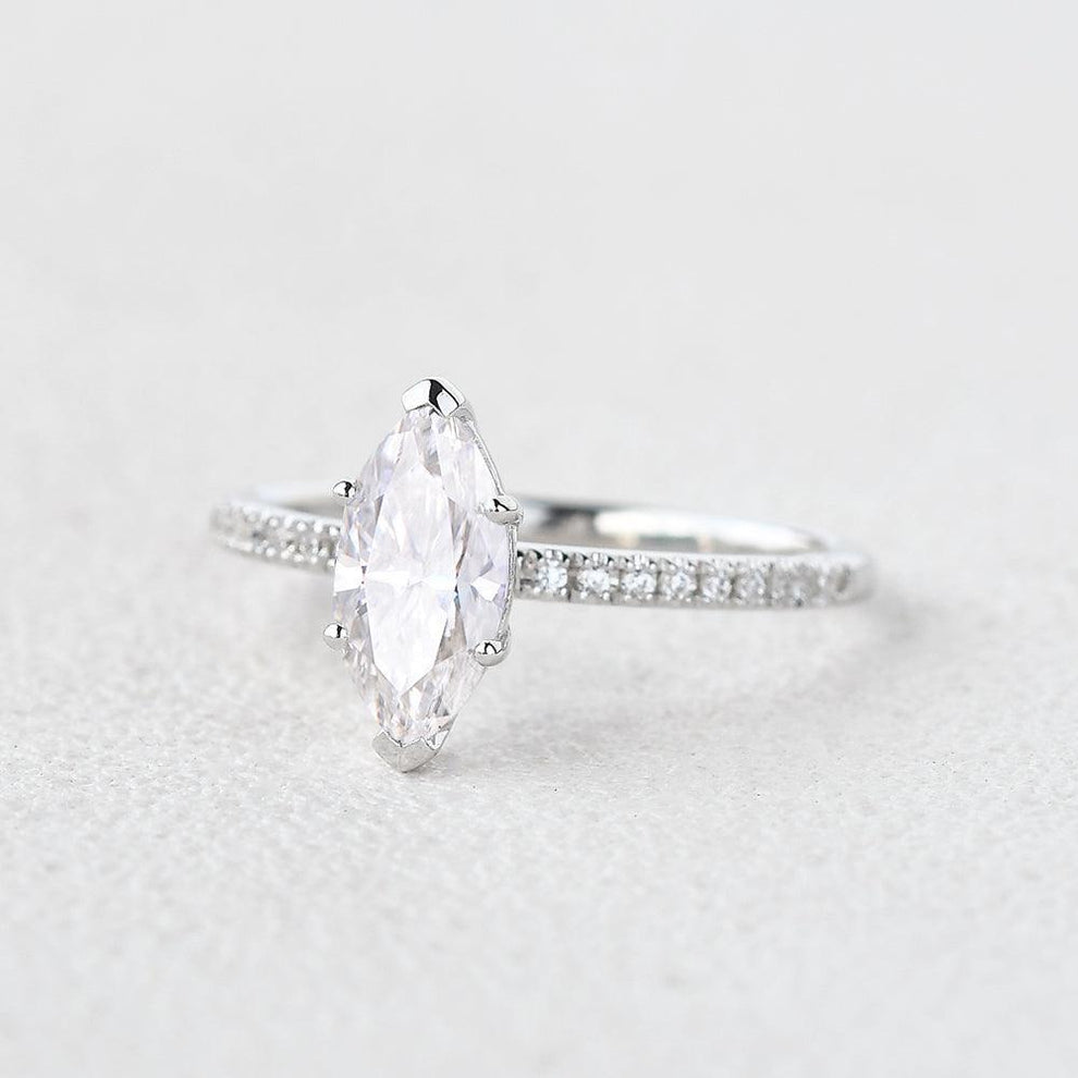 Grace‘s Minimal | Marquise Diamond Solitaire Engagement Ring with Pave Band.