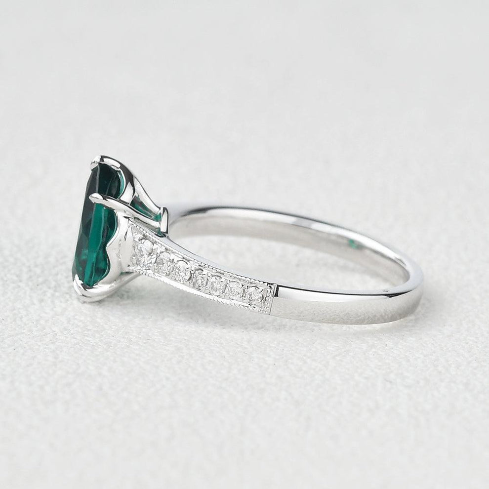 Olive’s Whisper | 1.5CT Classic Pear Cut Lab Emerald Engagement Ring.