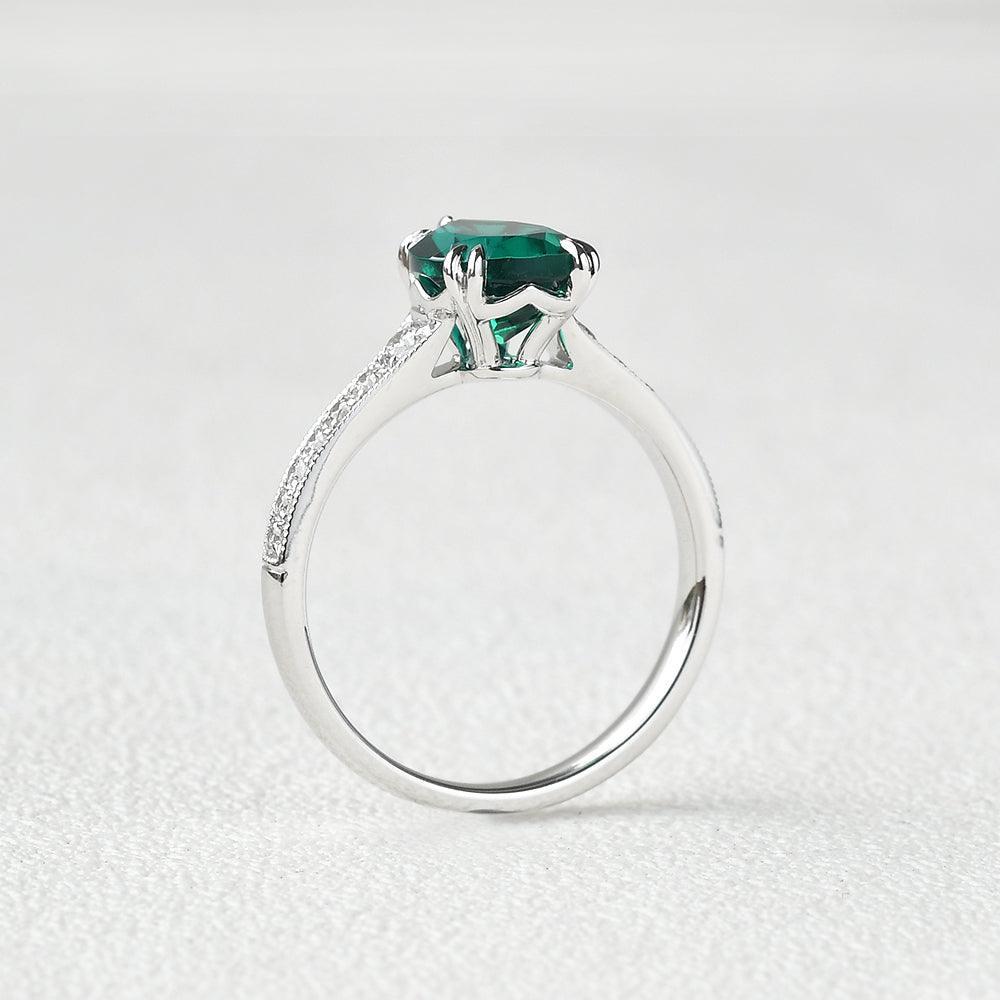 Olive’s Whisper | 1.5CT Classic Pear Cut Lab Emerald Engagement Ring.