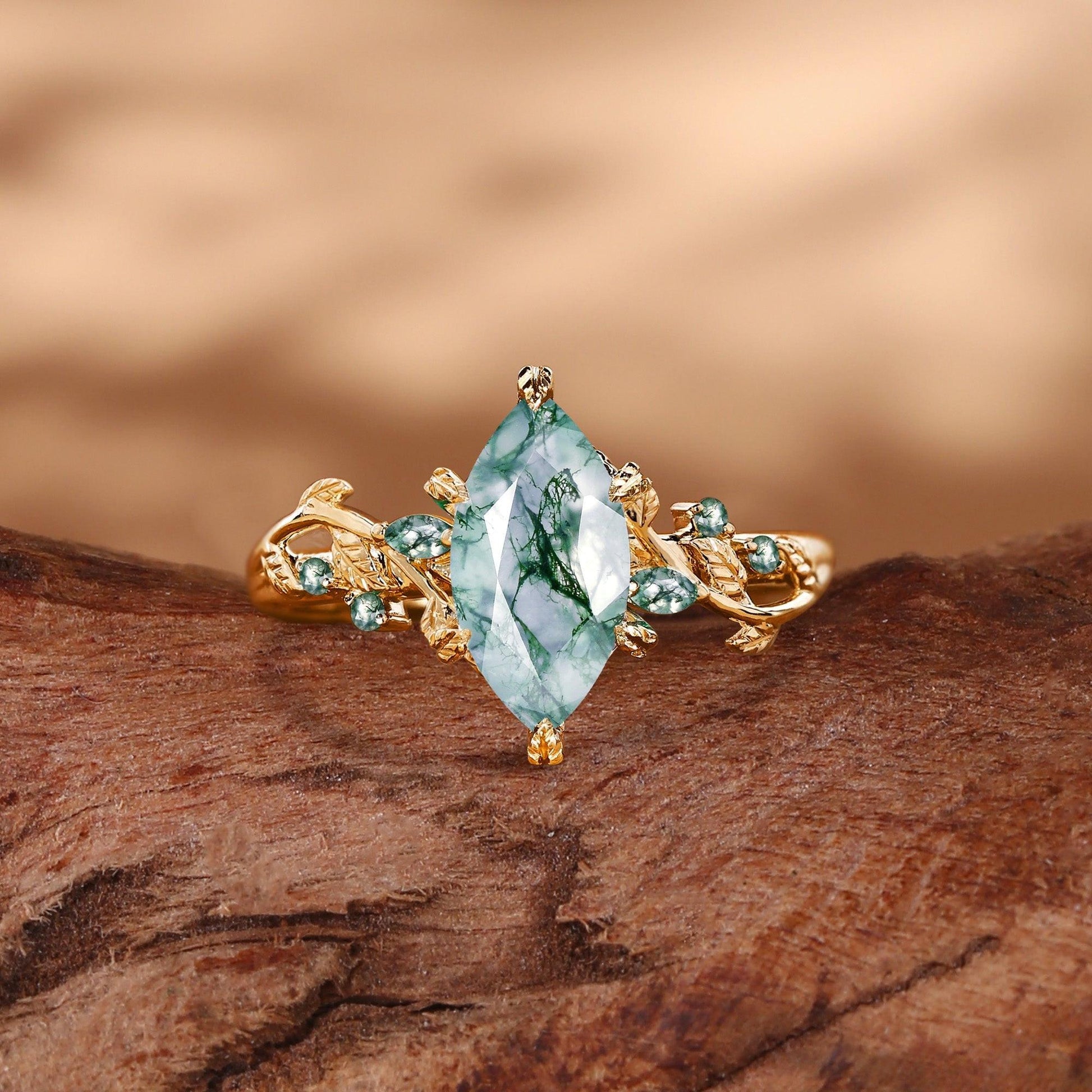 Celandine’s Twine | Marquise Moss Agate Leafy Twist Engagement Ring.