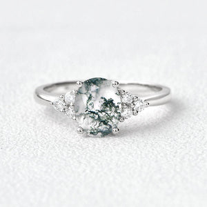 Aurora’s Dew | Oval Moss Agate Classic Cluster Engagement Ring.