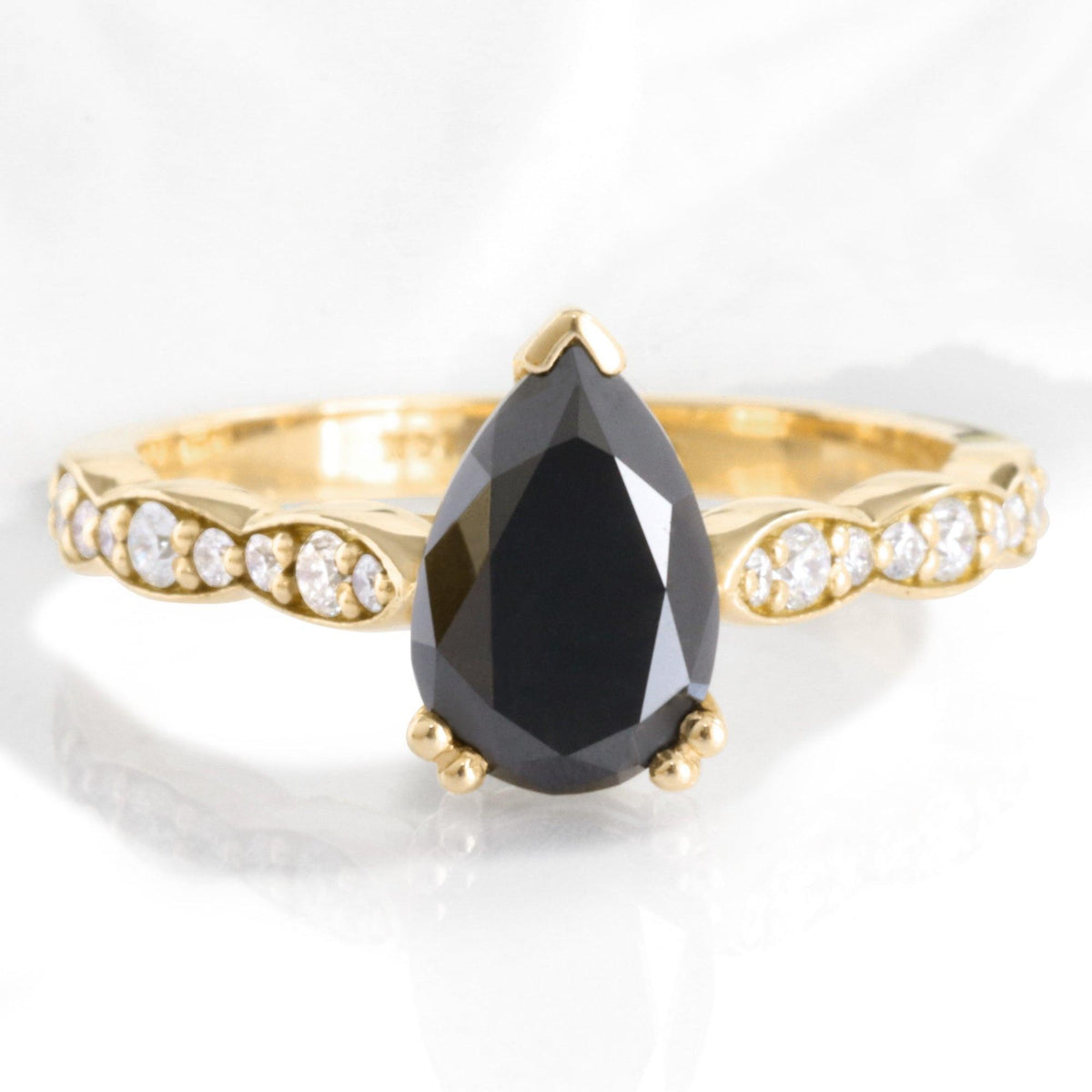 Grace’s Scallop | Pear Black Diamond Solitaire Engagement Ring.