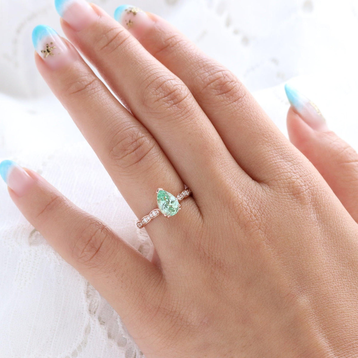 Cora's Mist | 1.5CT Pear Cut Green Sapphire Engagement Ring.