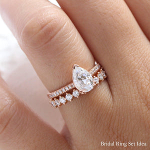 Pear Moissanite Engagement Ring in Grace Solitaire Pave Diamond Band.