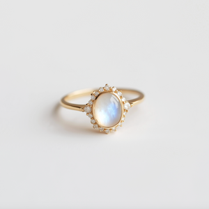 Elara’s Luster | Classic Oval Moonstone Halo Engagement Ring.