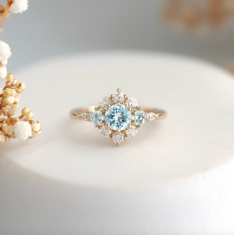 Elsa’s Flurry | Round Cut Snow Flakes Aquamarine Engagement Ring.