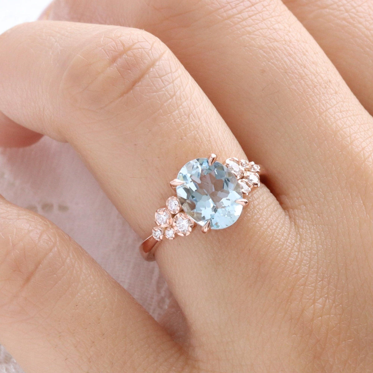 Marina’s Bloom | Oval Aquamarine Diamond Floral Cluster Ring.