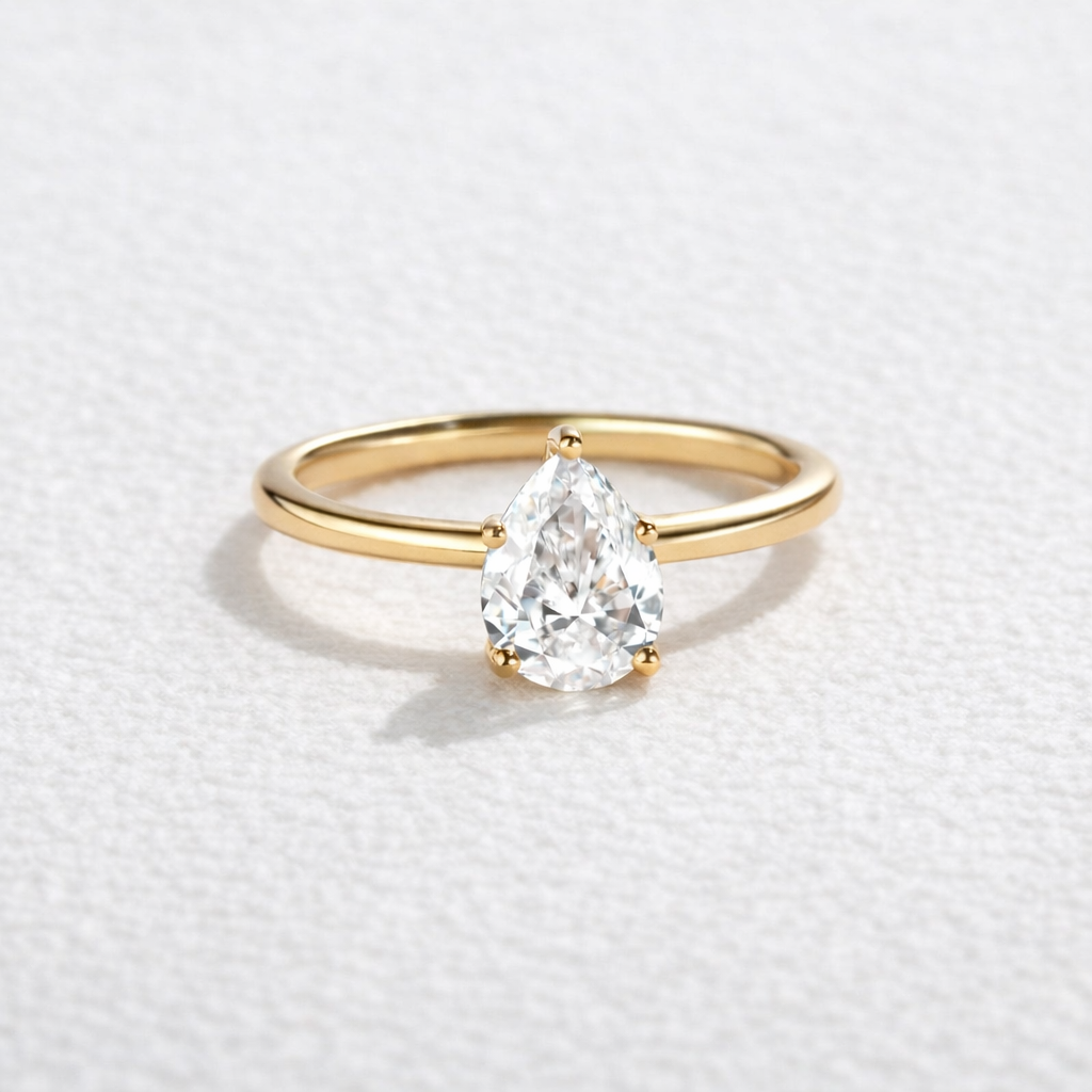 1.0ct Pear Shaped Moissanite Classic Solitaire Ring.