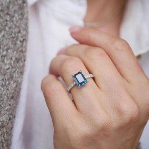 Ianthe’s Azure | 3CT Emerald‑Cut Sapphire Solitaire Engagement Ring.