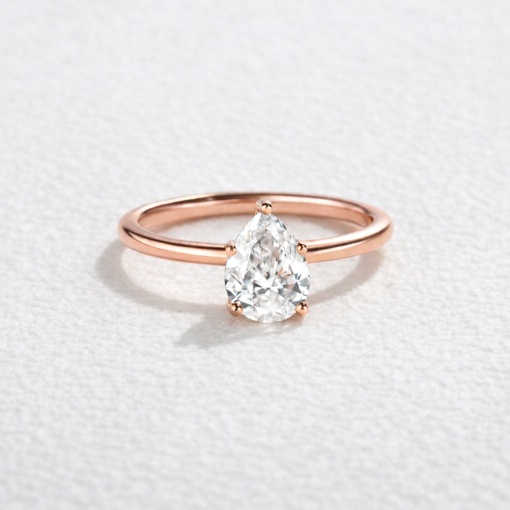 1.0ct Pear Shaped Moissanite Classic Solitaire Ring.