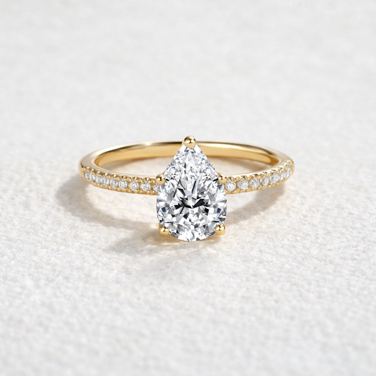 Classic 1.5ct Pear Shaped Moissanite Pave Solitaire Ring.