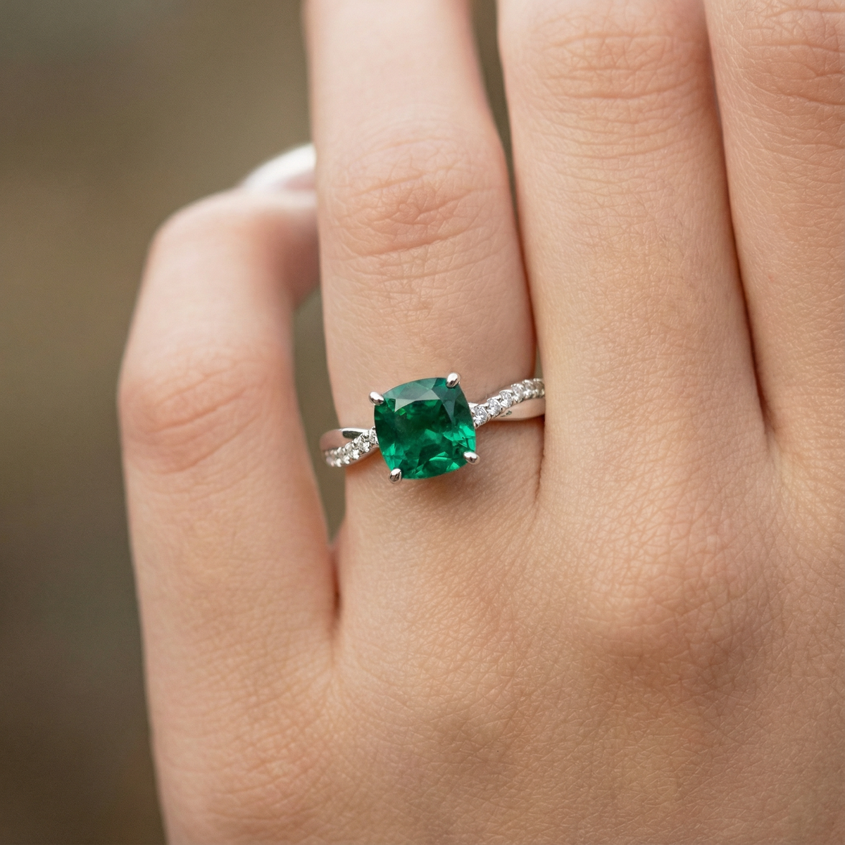 Ivy’s Twist | 2CT Cushion Cut Emerald Solitaire Engagement Ring.