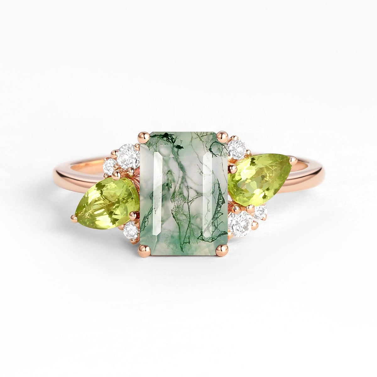Nature Inspired Emerald Cut Moss Agate Double Pear Peridot Engagement Ring.