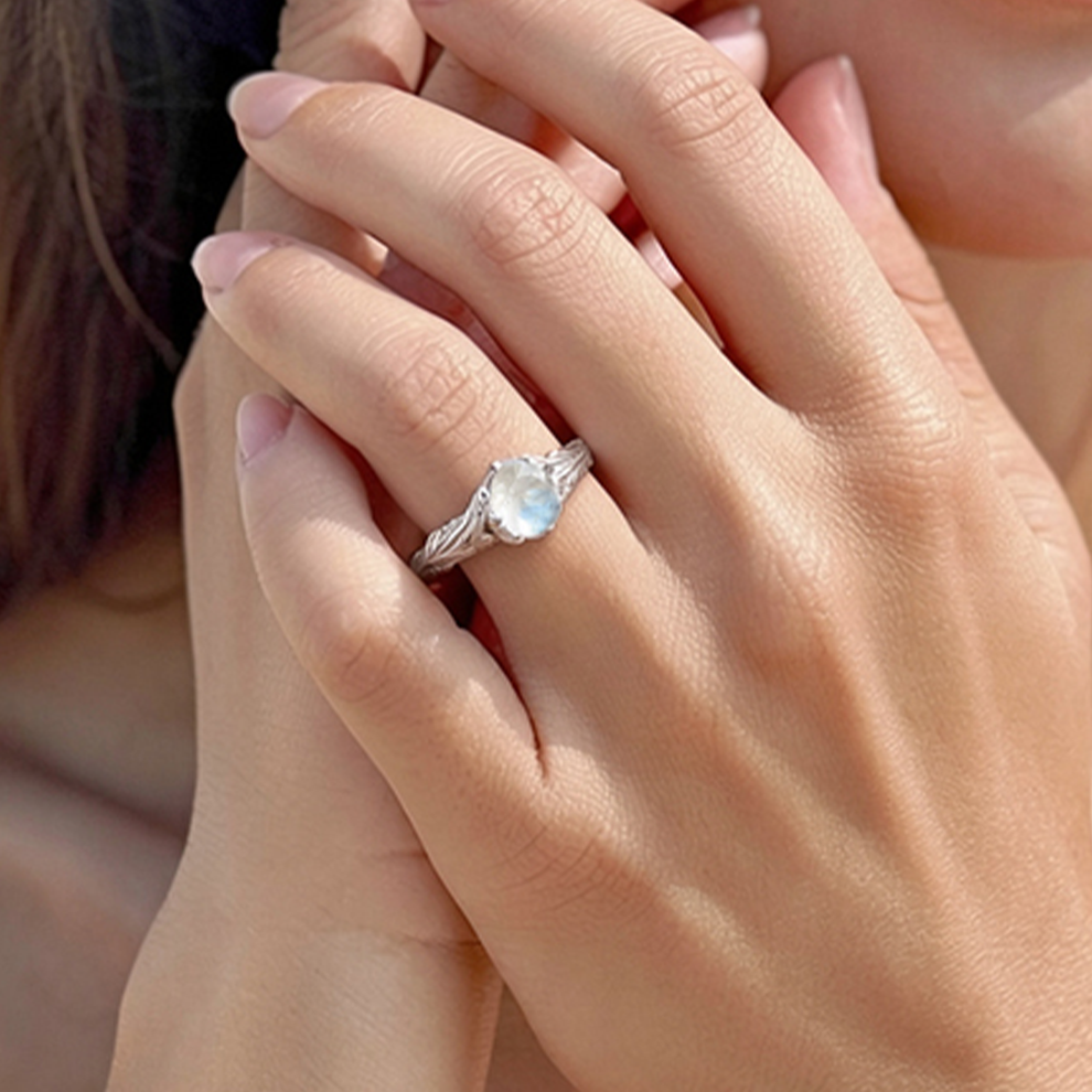 Athena’s Wings | Round Moonstone Olive Branch Engagement Ring.