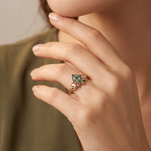 Flora’s Laurel | Marquise Cut Moss Agate Engagement Ring with Diamond Leaves.
