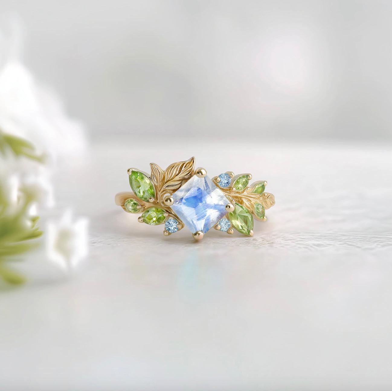 The Moonlight Canvas Engagement Ring – Square Moonstone Set in a Blooming Vine Band.
