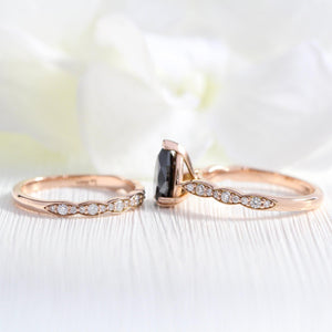 Aria‘s Cipher | Pear Cut Black Diamond Ring & Matching Diamond Band Ring Set.