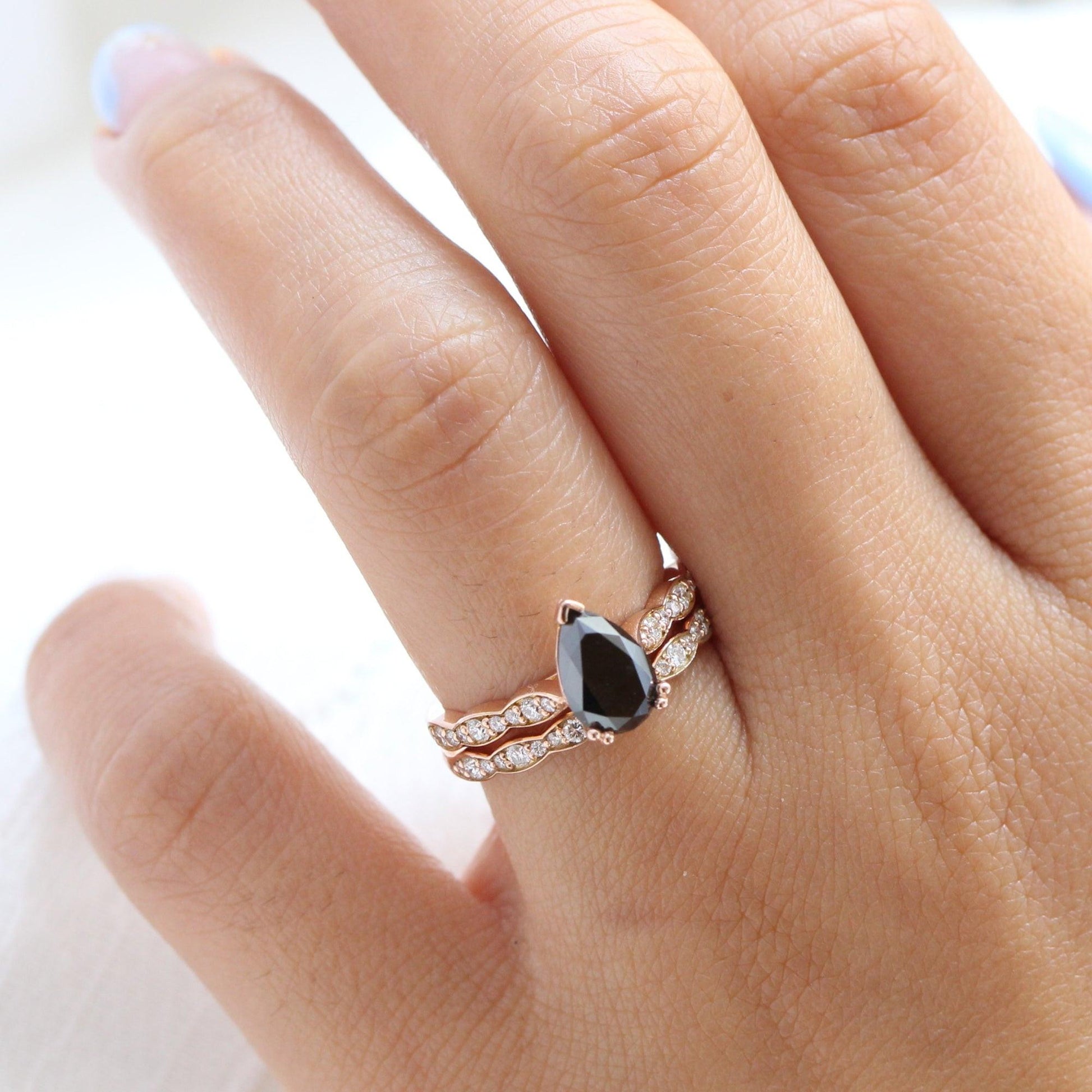 Aria‘s Cipher | Pear Cut Black Diamond Ring & Matching Diamond Band Ring Set.