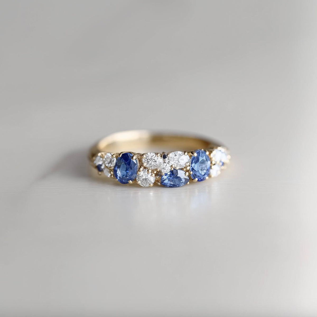 Cordelia‘s Wreath | Thistle Blue Sapphire & Moissanite Half‑Eternity Ring.
