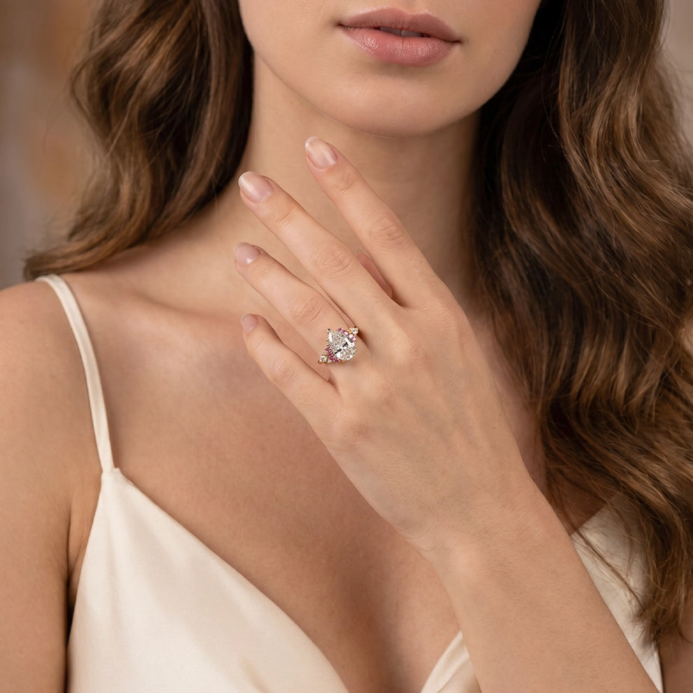 Aurora’s Kiss | 2CT Pear Cut Diamond Gold Engagement Ring.