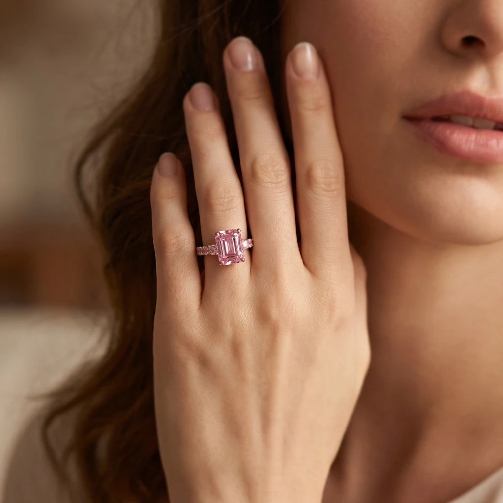 Aurora’s Aureole | 3CT Emerald Cut Pink Sapphire Engagement Ring