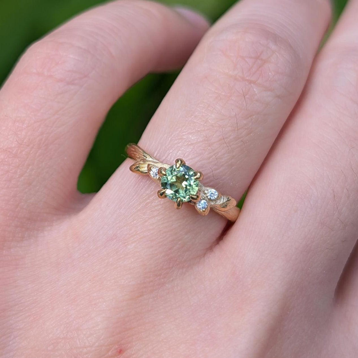 Fairy Glen | Teal Sapphire Engagement Ring with Leaf Band.