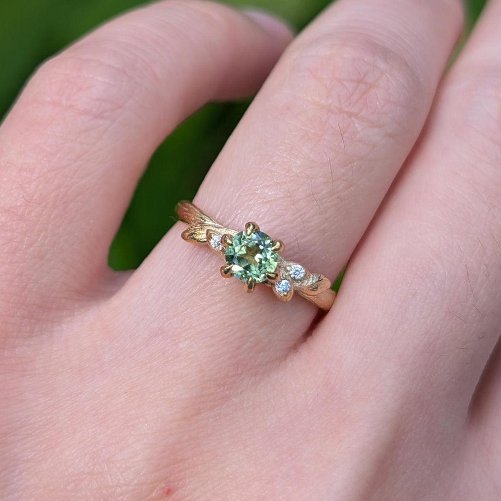 Fairy Glen | Teal Sapphire Engagement Ring with Leaf Band.