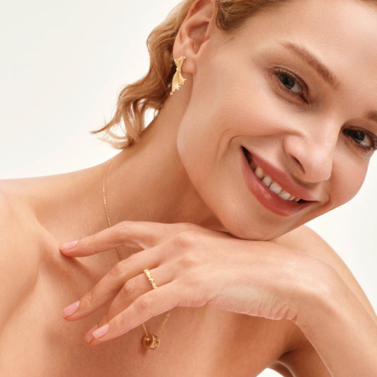 Golden Bow Elegance Hoop Huggies Earrings - Stellaradorn